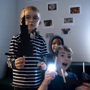 Children playing shadow theater in Primary School, Billund, Denmark