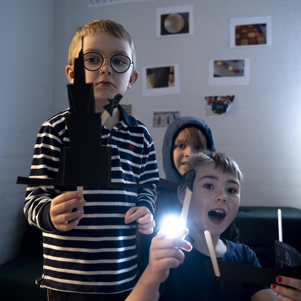 Children playing shadow theater in Primary School, Billund, Denmark